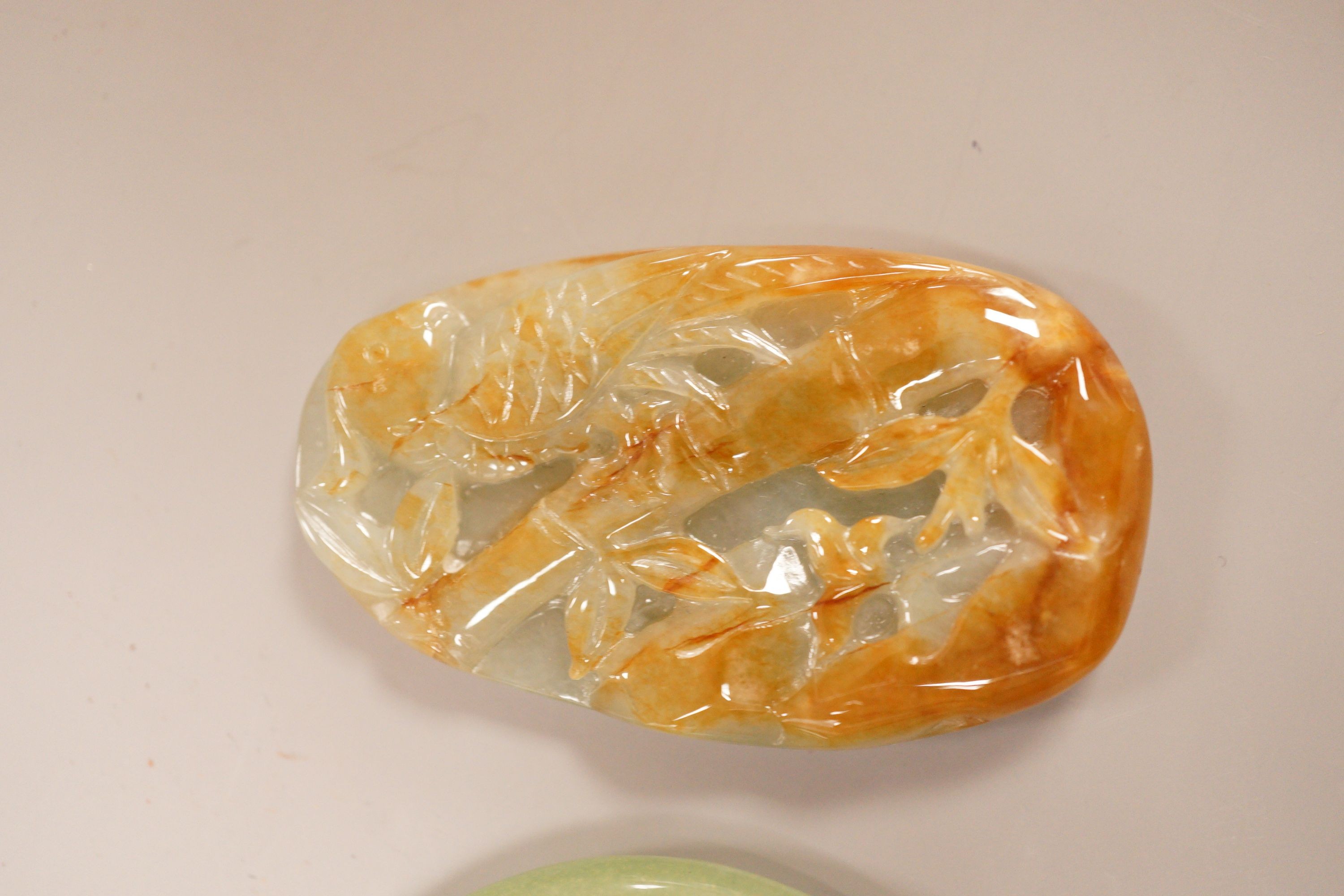 A Chinese jadeite plaque and an aventurine quartz bangle